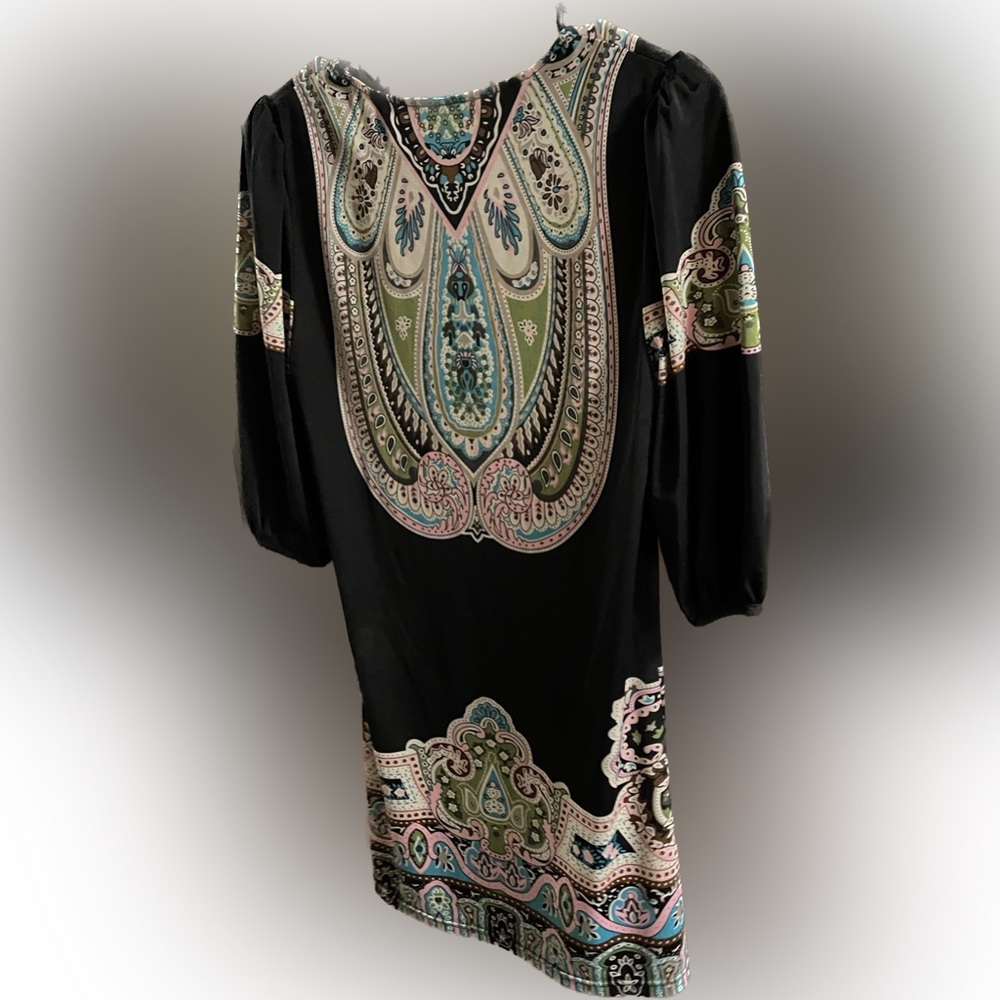 Black, mid length dress with fun pattern. Medium.
